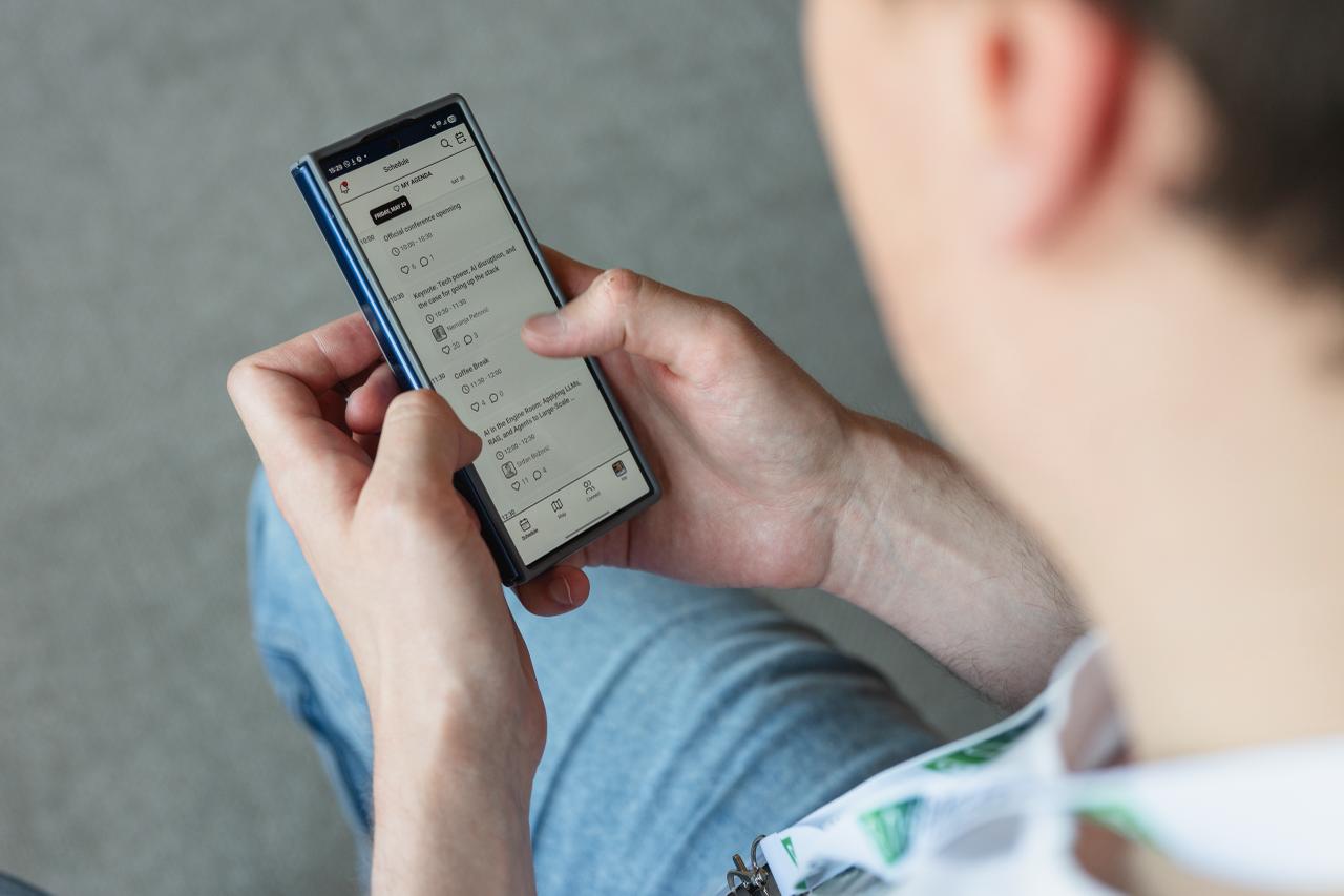 Machine Learning Conference attendee using the event app